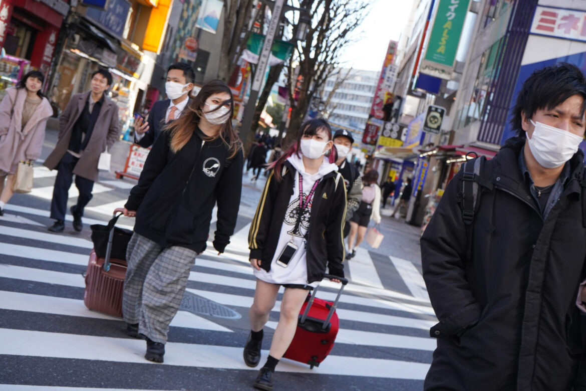 People crossing the Street in Shinjuku during the state of emergency