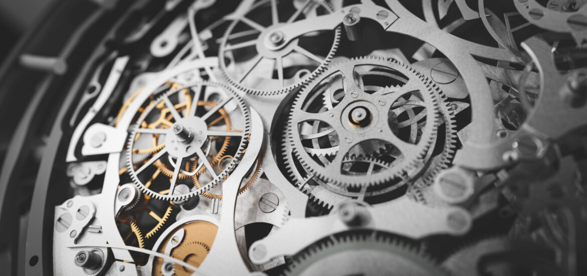 Gears and cogs in clockwork watch mechanism. Craft and precision